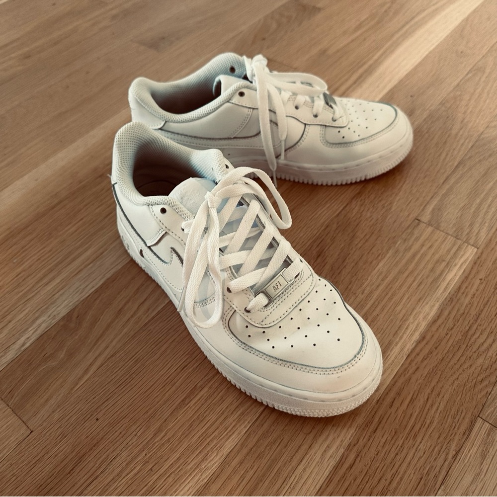 Nike All-White Low-Top Sneakers with Perforated Details